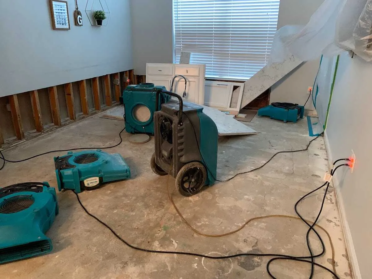 Dehumidifier in flood-cut room for Water Damage Restoration in Fresno